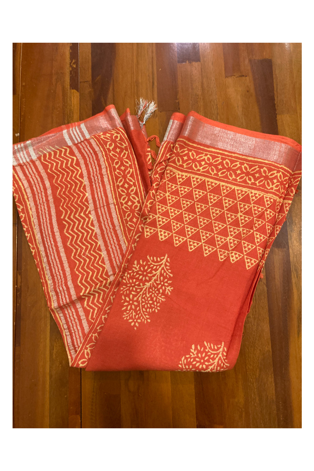 Southloom Linen Orange Saree with White Designer Prints and Tassels works on Pallu