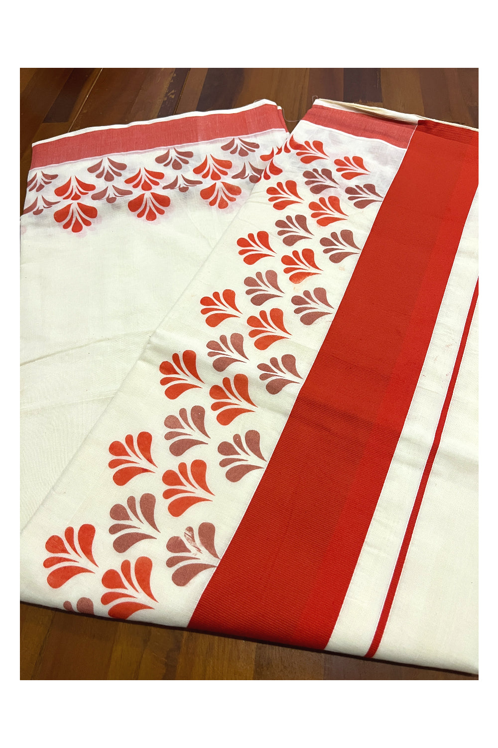 Pure Cotton Off White Kerala Saree with Orange Block Prints in Orange Border