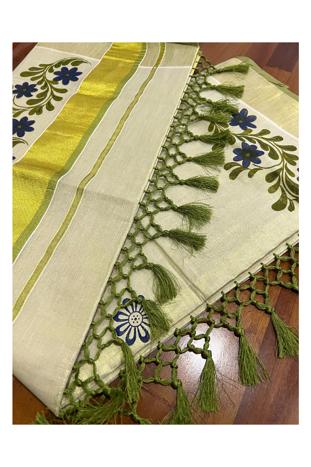 Kerala Tissue Kasavu Saree with Light Green Dark Blue Mural Floral Design and Tassels on Pallu