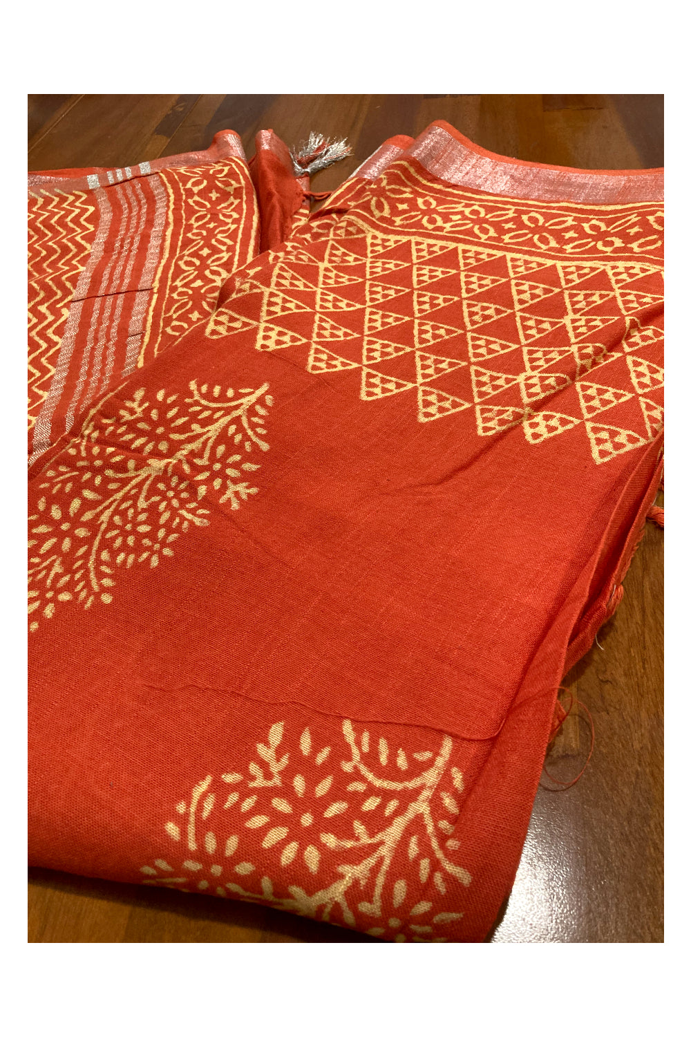 Southloom Linen Orange Saree with White Designer Prints and Tassels works on Pallu