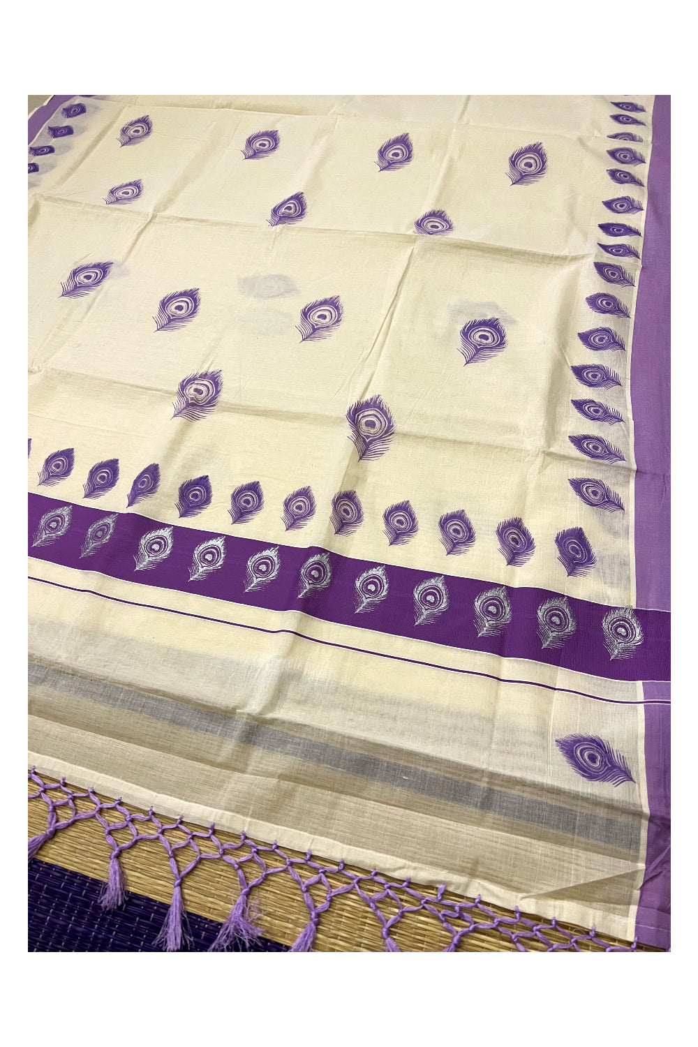 Off White Pure Cotton Kerala Saree with Peacock Feather Block Prints on Violet Border and Tassels on Pallu