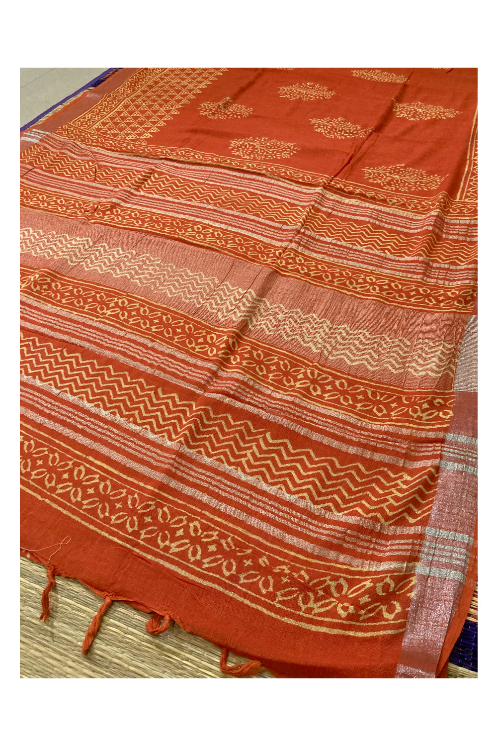 Southloom Linen Orange Saree with White Designer Prints and Tassels works on Pallu