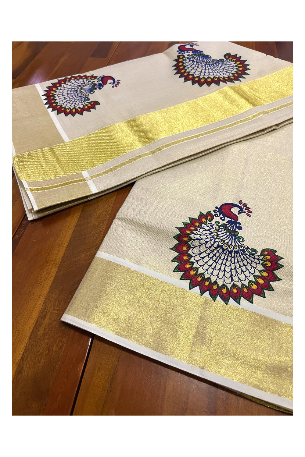 Kerala Tissue Kasavu Saree with Peacock Mural Printed Design