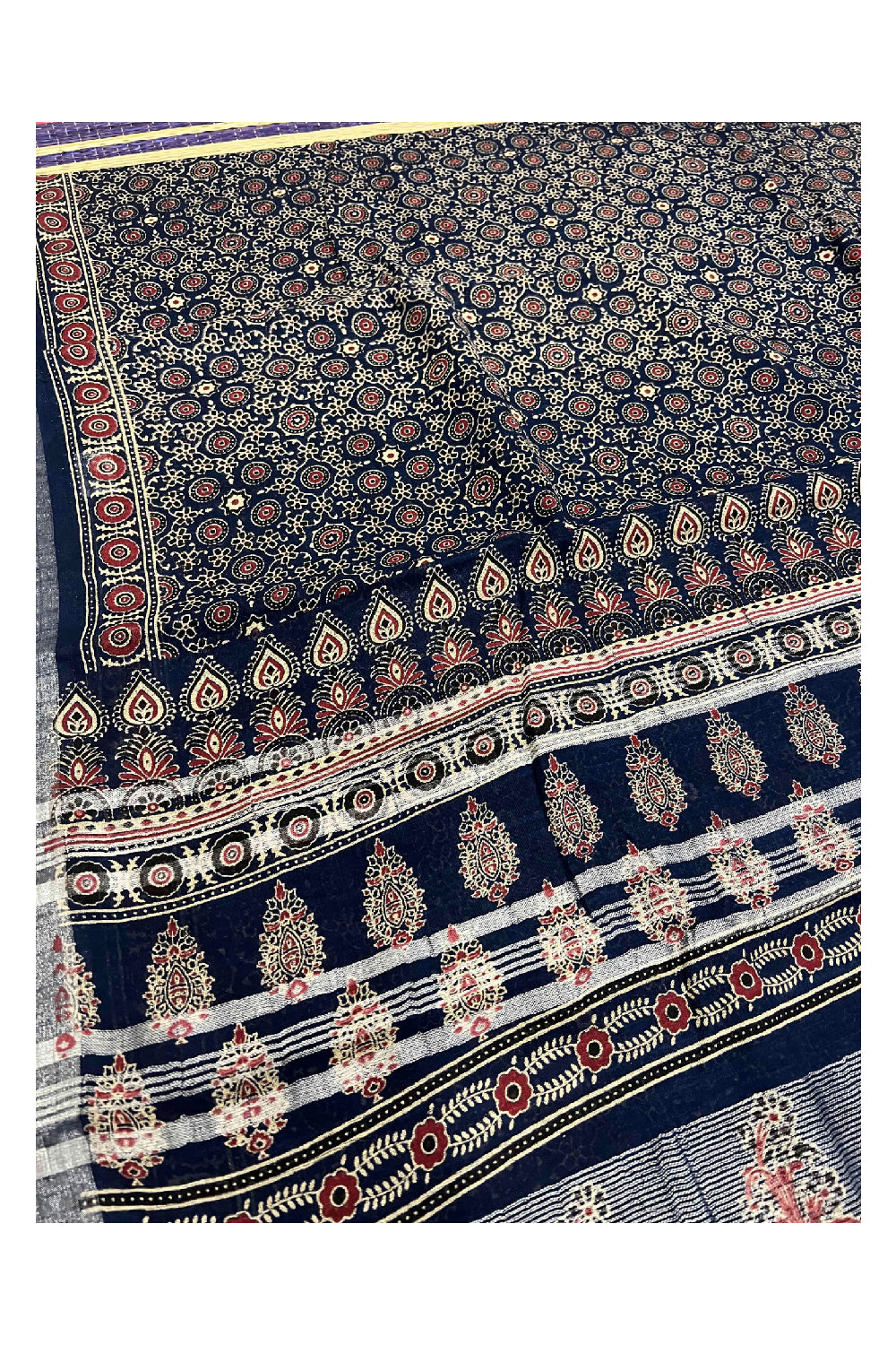 Southloom Linen Designer Saree with Ajrakh Prints on Dark Blue Body and Tassels on Pallu