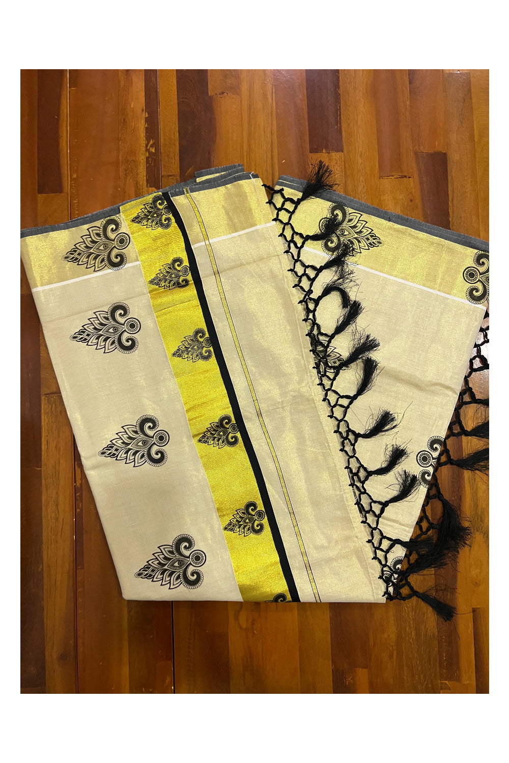 Kerala Tissue Kasavu Saree with Black Block Printed Design and Tassels Work on Pallu