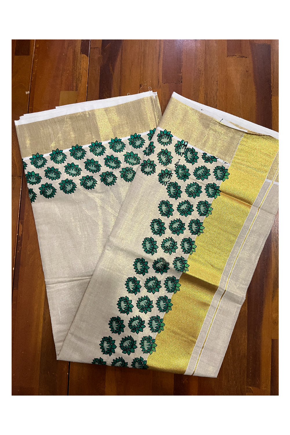 Kerala Tissue Kasavu Saree with Green Floral Block Printed Design