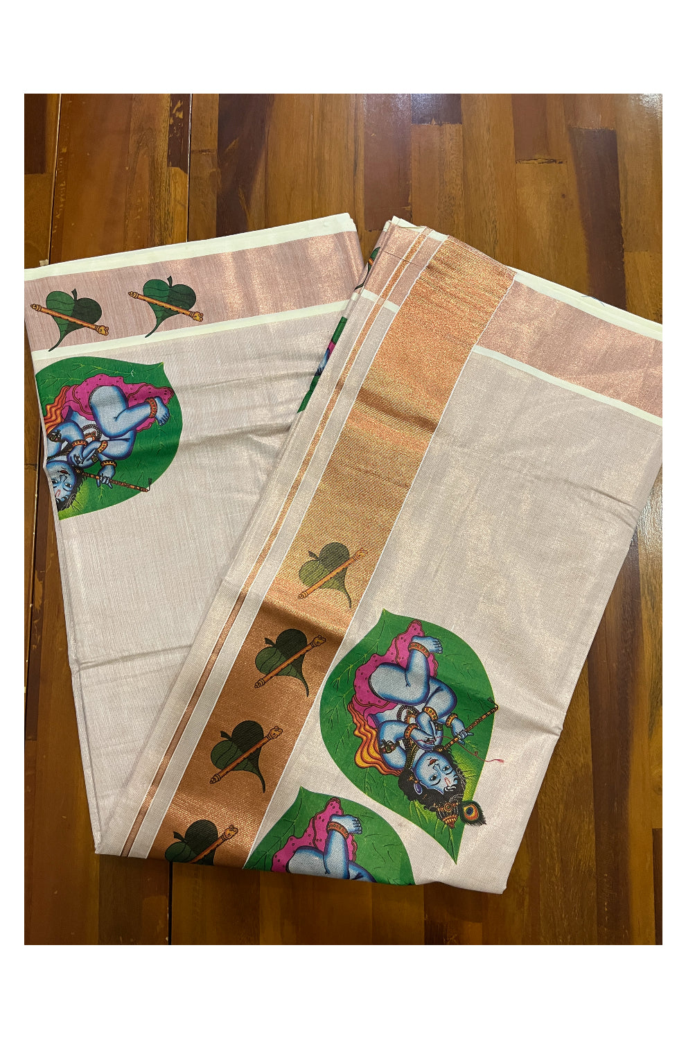 Kerala Copper Tissue Kasavu Saree With Mural Printed Baby Krishna Design and Leaf Prints on Border