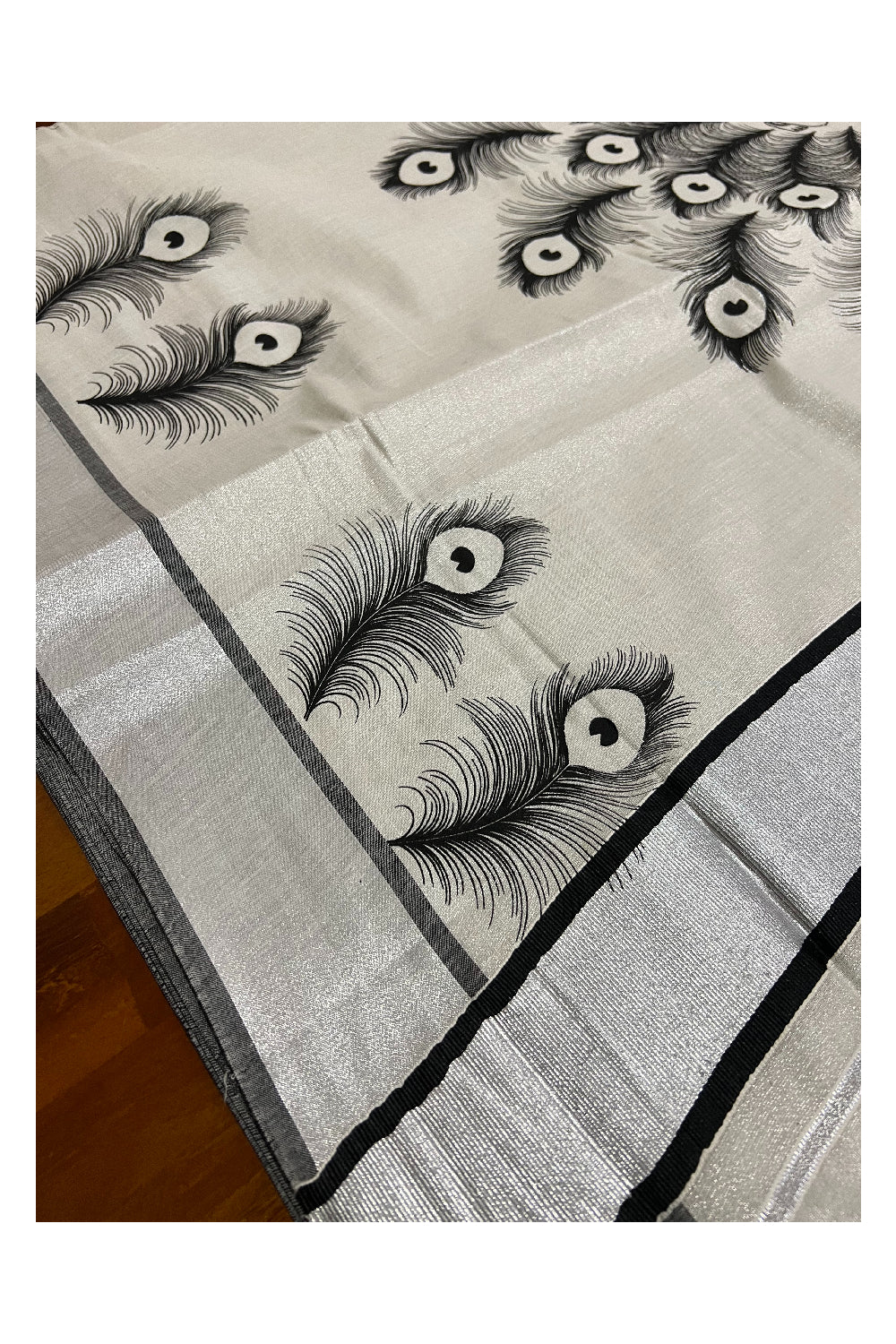 Kerala Silver Tissue Kasavu Saree with Peacock Feather and Baby Krishna Mural Prints on Pallu