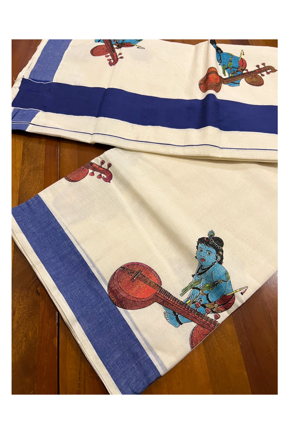 Kerala Pure Cotton Blue Border Saree with Baby Krishna and Veena Mural Printed Design