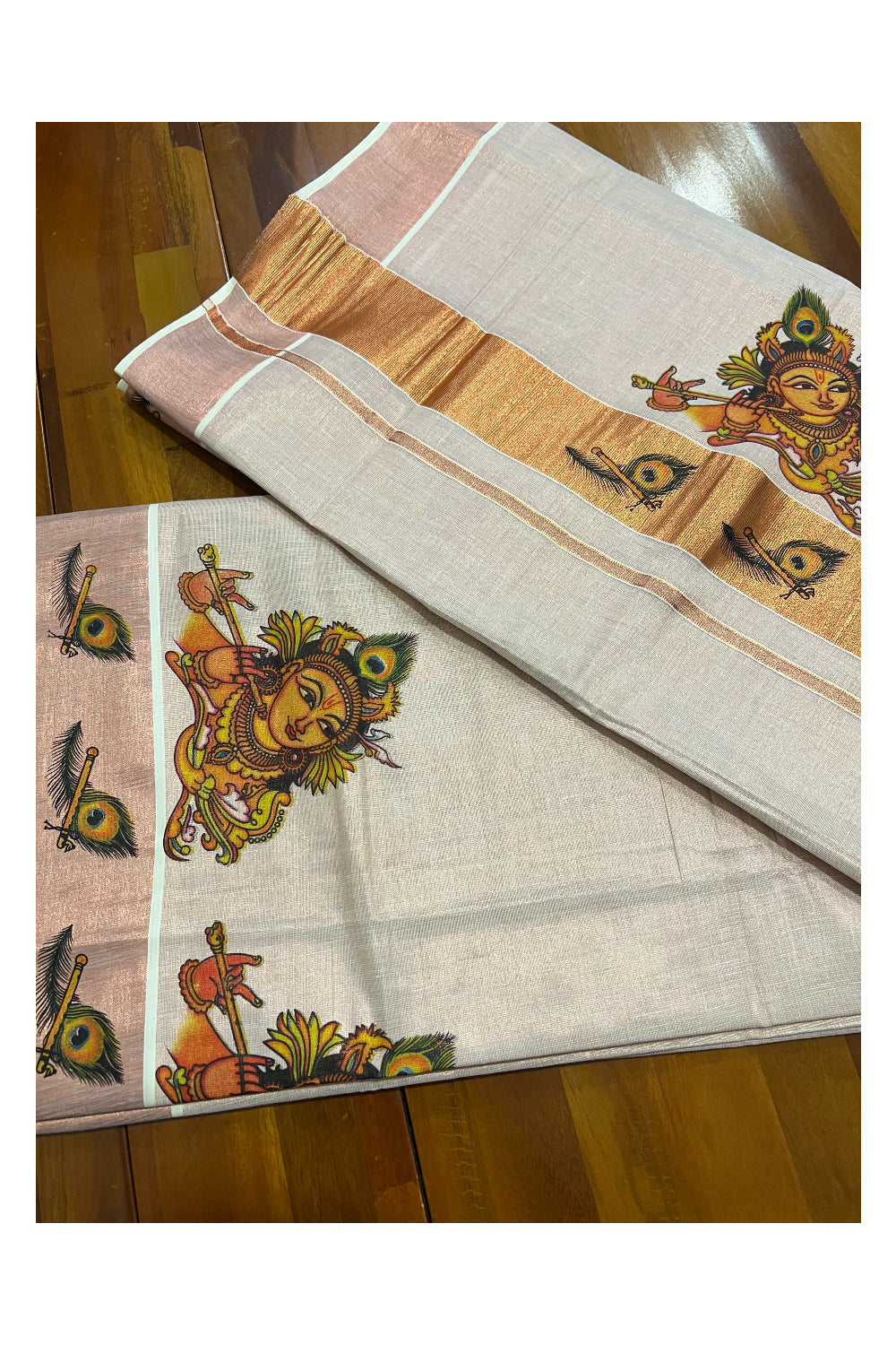 Kerala Copper Tissue Kasavu Saree With Mural Printed Krishna Face Design and Feather Prints on Border