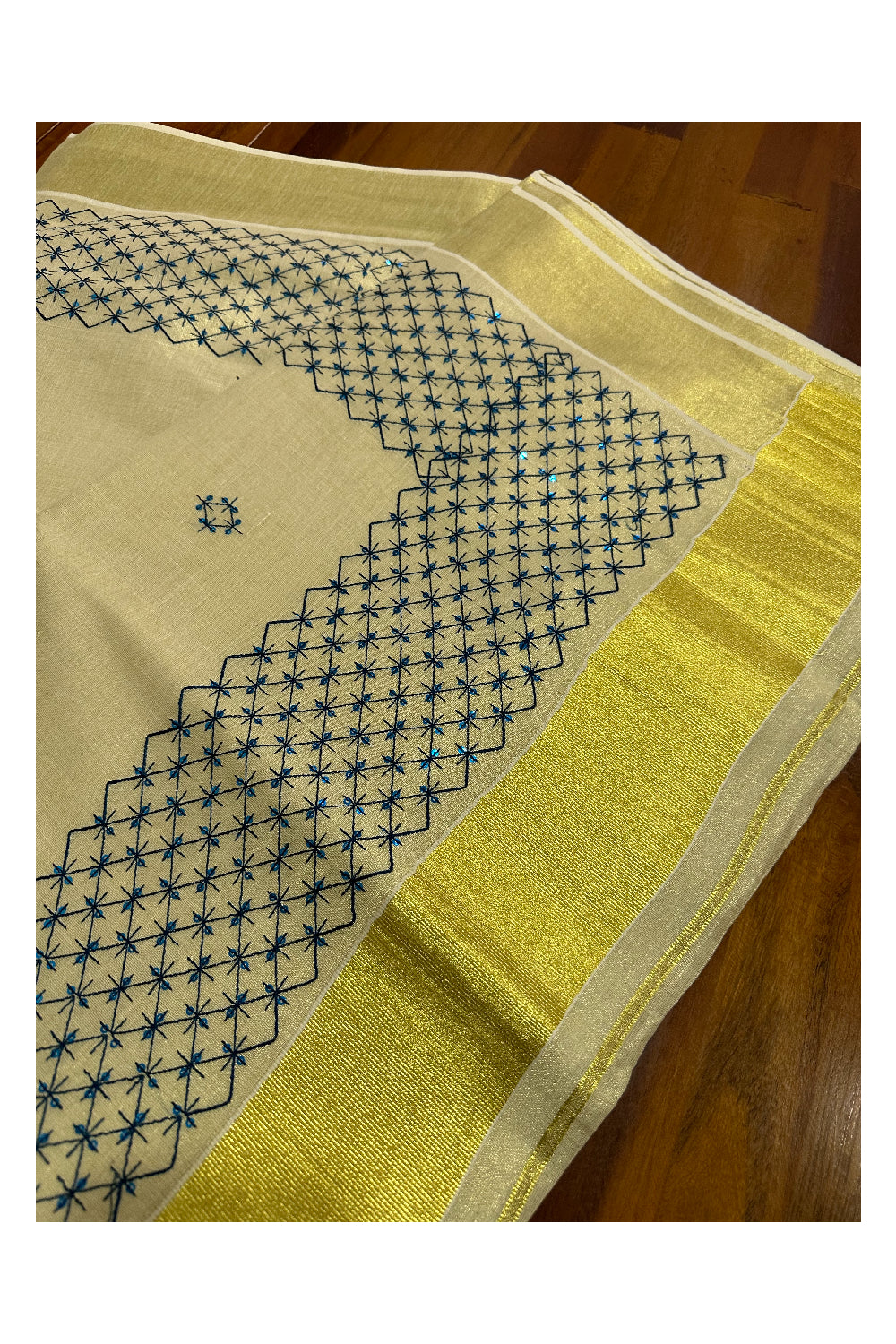 Kerala Tissue Kasavu Sequins Heavy Work Saree with Blue Thread Work Design