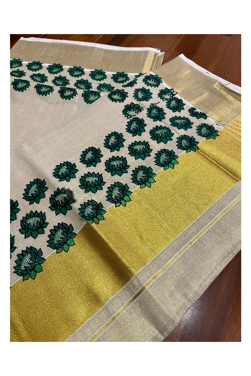 Kerala Tissue Kasavu Saree with Green Floral Block Printed Design