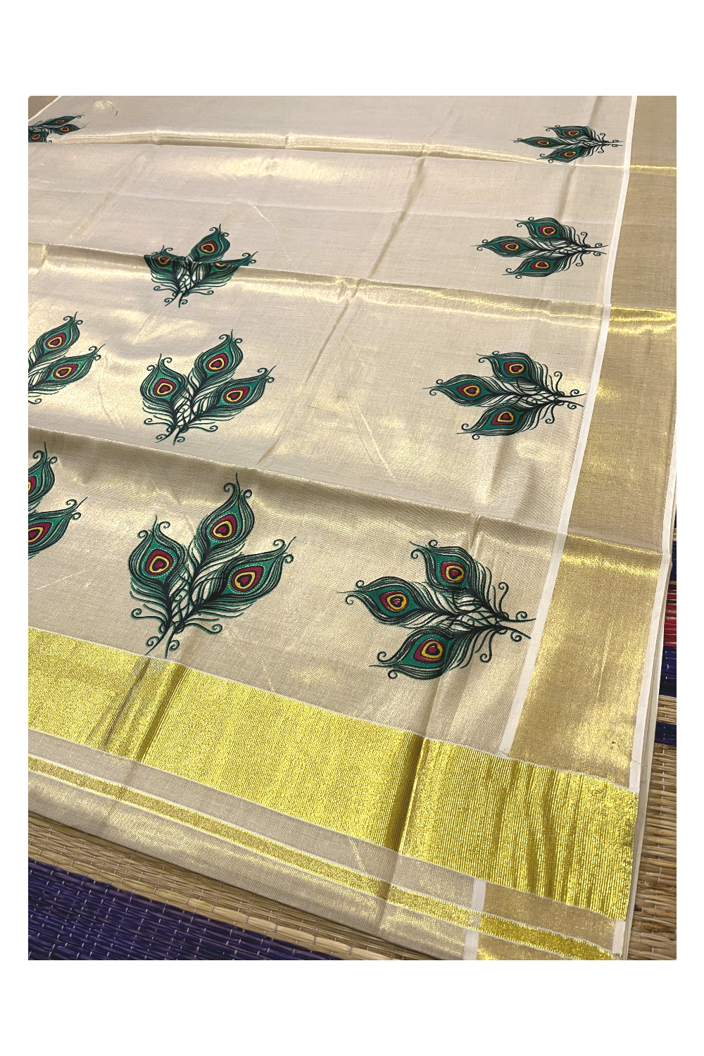 Kerala Tissue Kasavu Saree with Feather Mural Printed Design