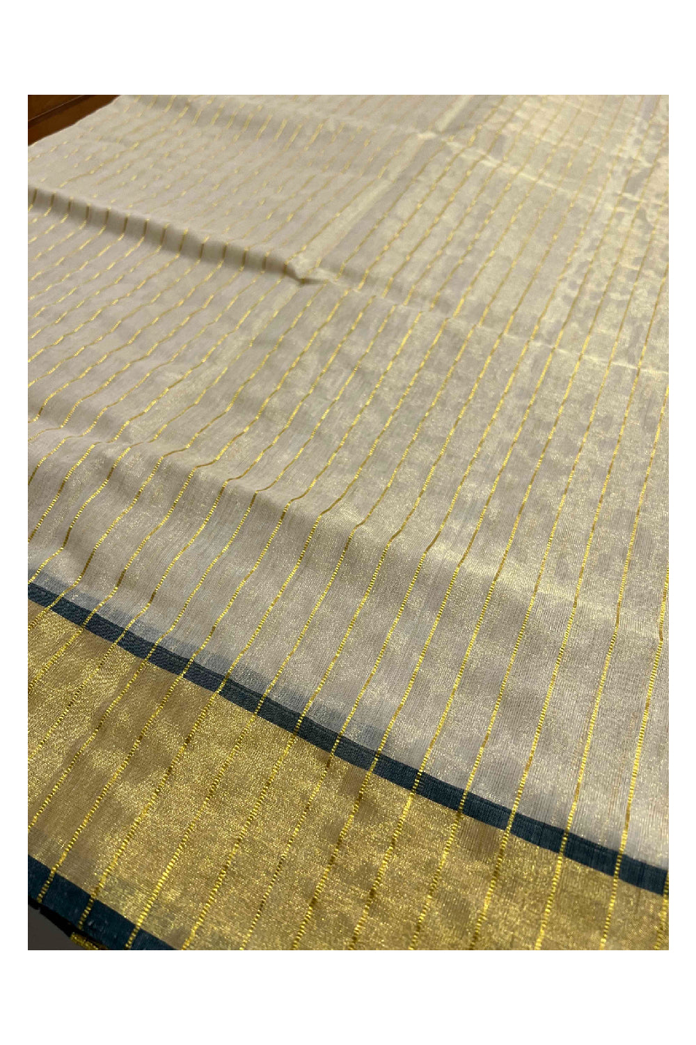 Southloom Premium Kuthampully Handloom Stripes Work Tissue Saree with Dark Green Border