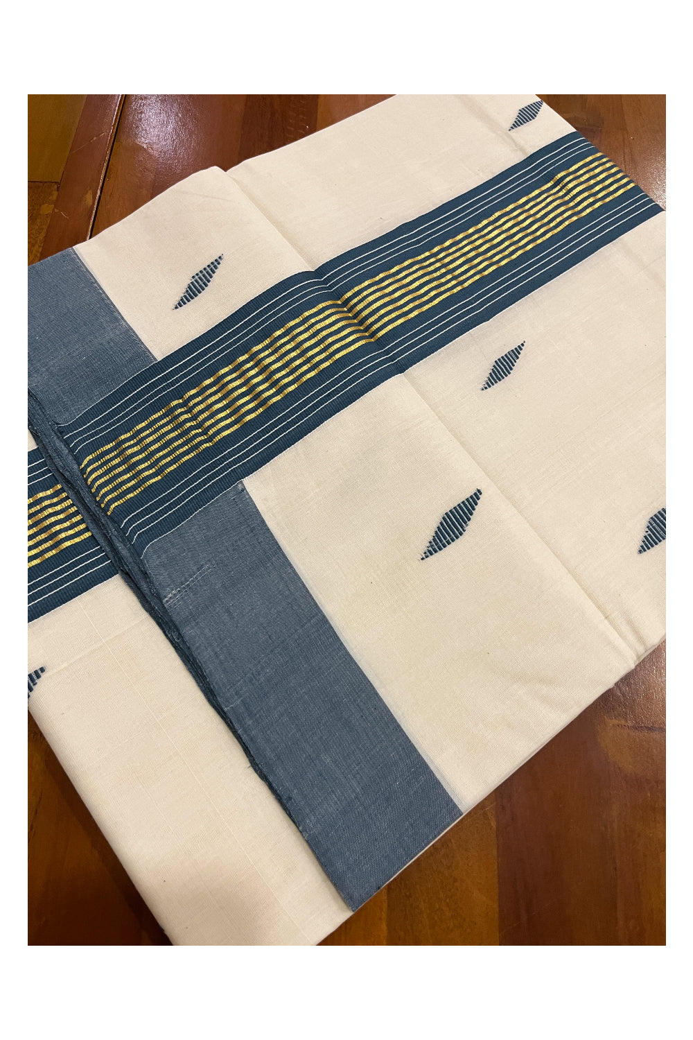 Southloom Balaramapuram Unakkupaavu Handloom Saree with Kasavu Blue Pallu and Butta Works on Body