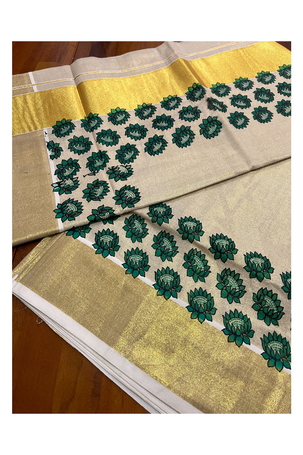 Kerala Tissue Kasavu Saree with Green Floral Block Printed Design