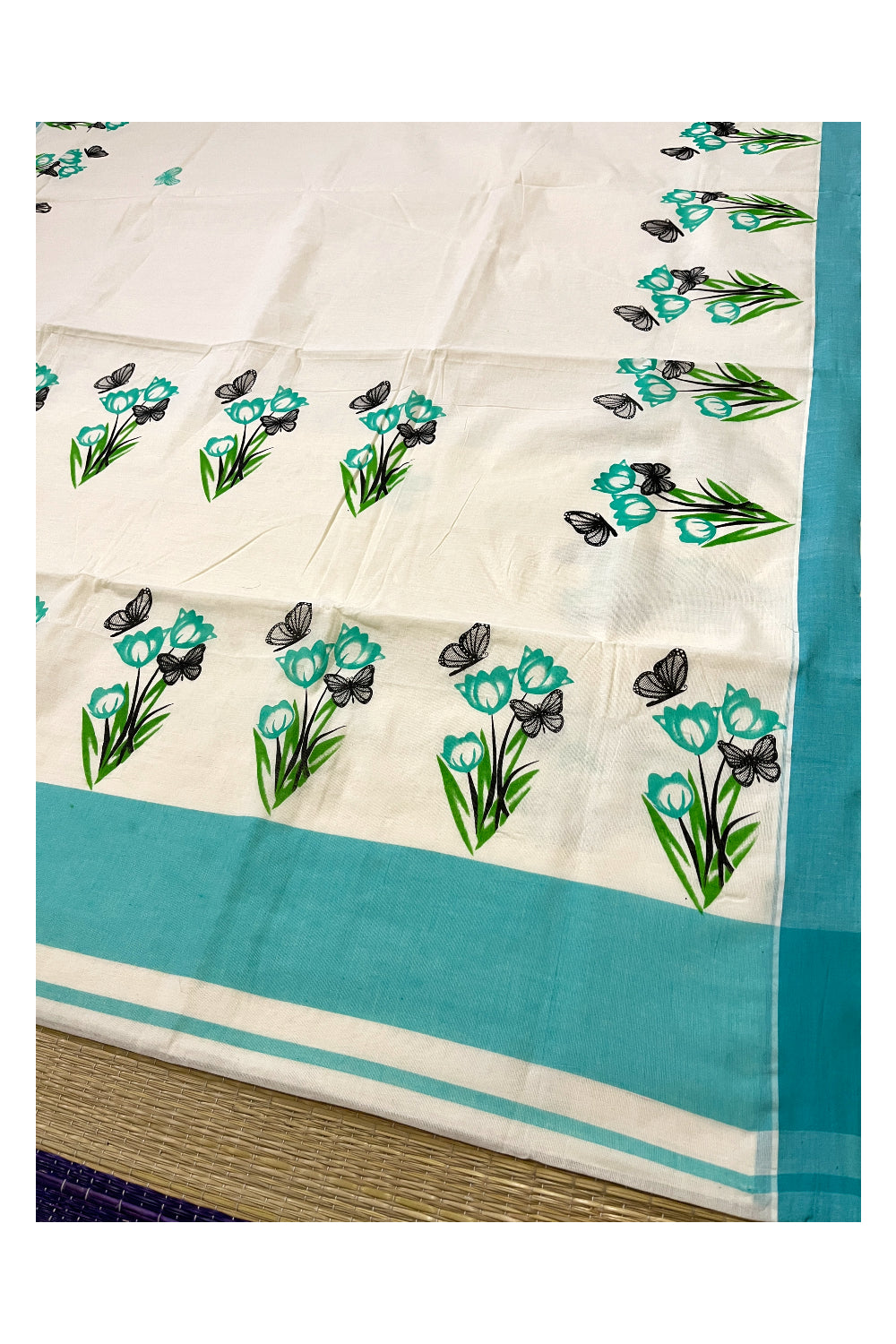 Pure Cotton Kerala Saree with Floral Block Prints and Turquoise Border