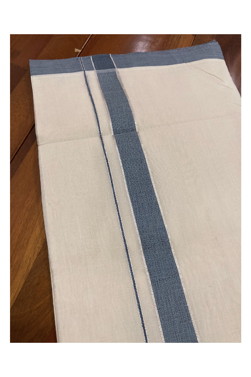 Southloom Balaramapuram Unakkupaavu Premium Handloom Mundu with Blue and Silver Kasavu Border