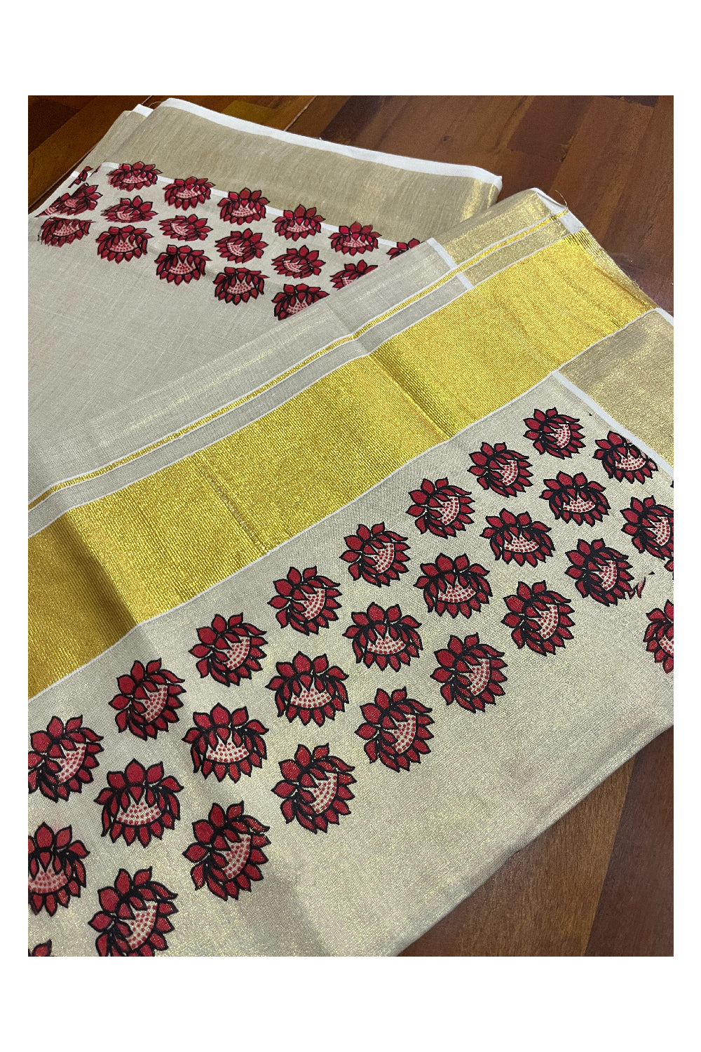 Kerala Tissue Kasavu Saree with Red Floral Block Printed Design