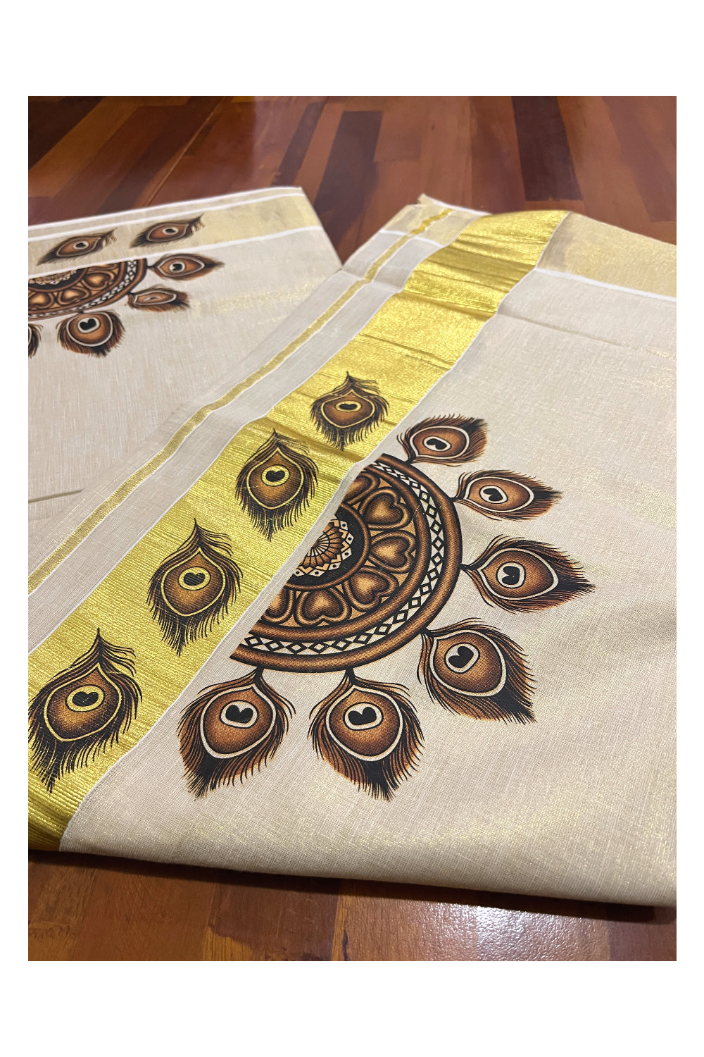 Kerala Tissue Kasavu Saree With Mural Semi Circle Feather Design and Printed Border