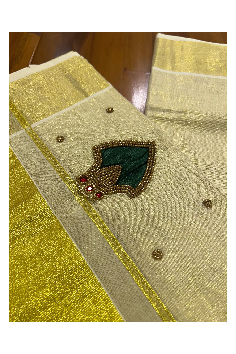 Kerala Tissue Kasavu Saree with Bead Work Design and Green Blouse Piece