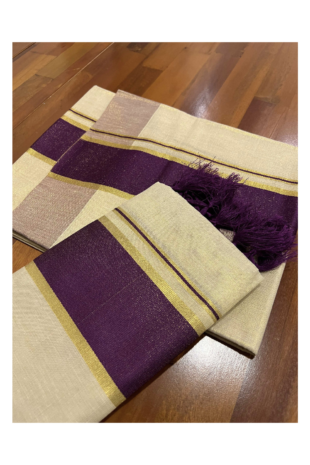 Kerala Tissue Kasavu Set Mundu (Mundum Neriyathum) with Purple Kara and Tassels on Pallu