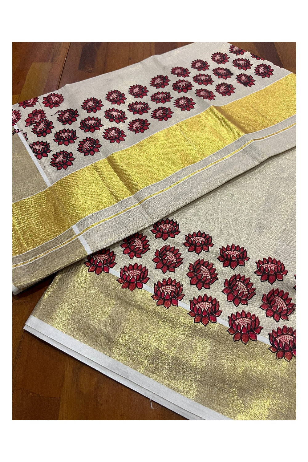 Kerala Tissue Kasavu Saree with Red Floral Block Printed Design