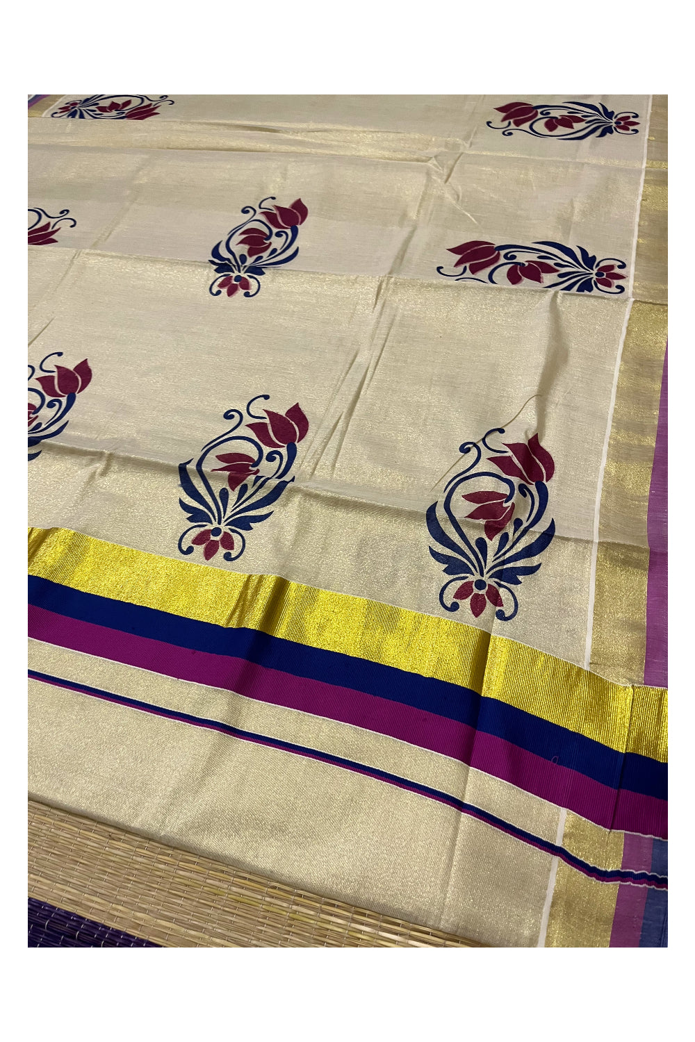 Kerala Tissue Kasavu Saree With Mural Floral Printed Design and Magenta Blue Border