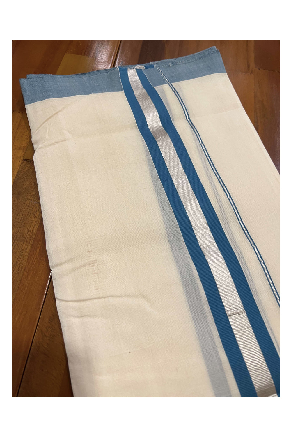 Southloom Balaramapuram Pure Cotton Handloom Mundu with Silver Kasavu and Teal Blue Border