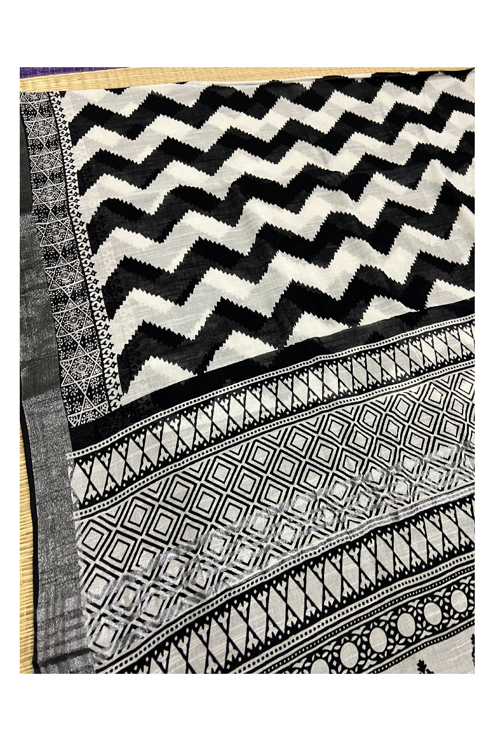 Southloom Linen White and Black Printed Designer Saree with Tassels on Pallu