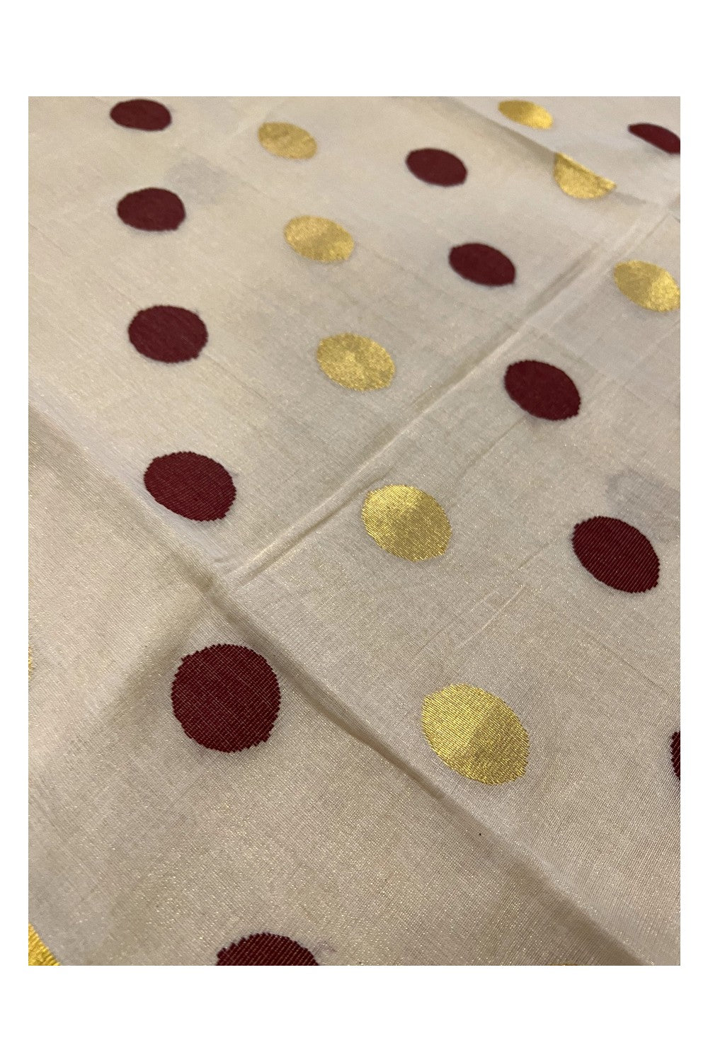 Southloom Premium Handloom Tissue Kasavu and Maroon Polka Work Saree