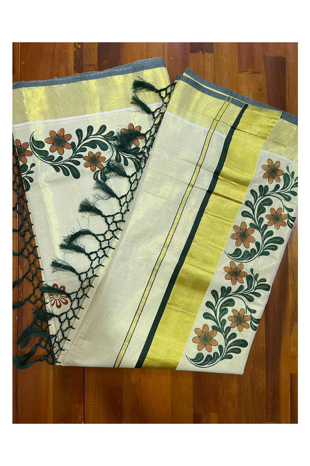 Kerala Tissue Kasavu Saree with Dark Green Dark Orange Mural Floral Design and Tassels on Pallu