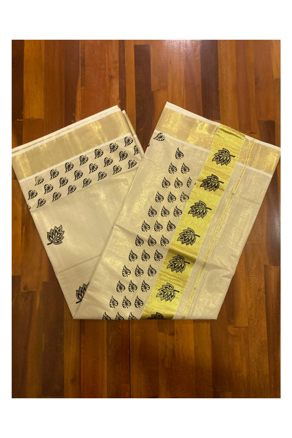 Kerala Tissue Kasavu Saree with Black Leaf Block Prints