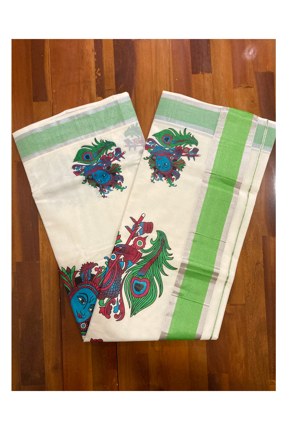 Pure Cotton Kerala Saree with Krishna Face Mural Prints and Silver Green Border