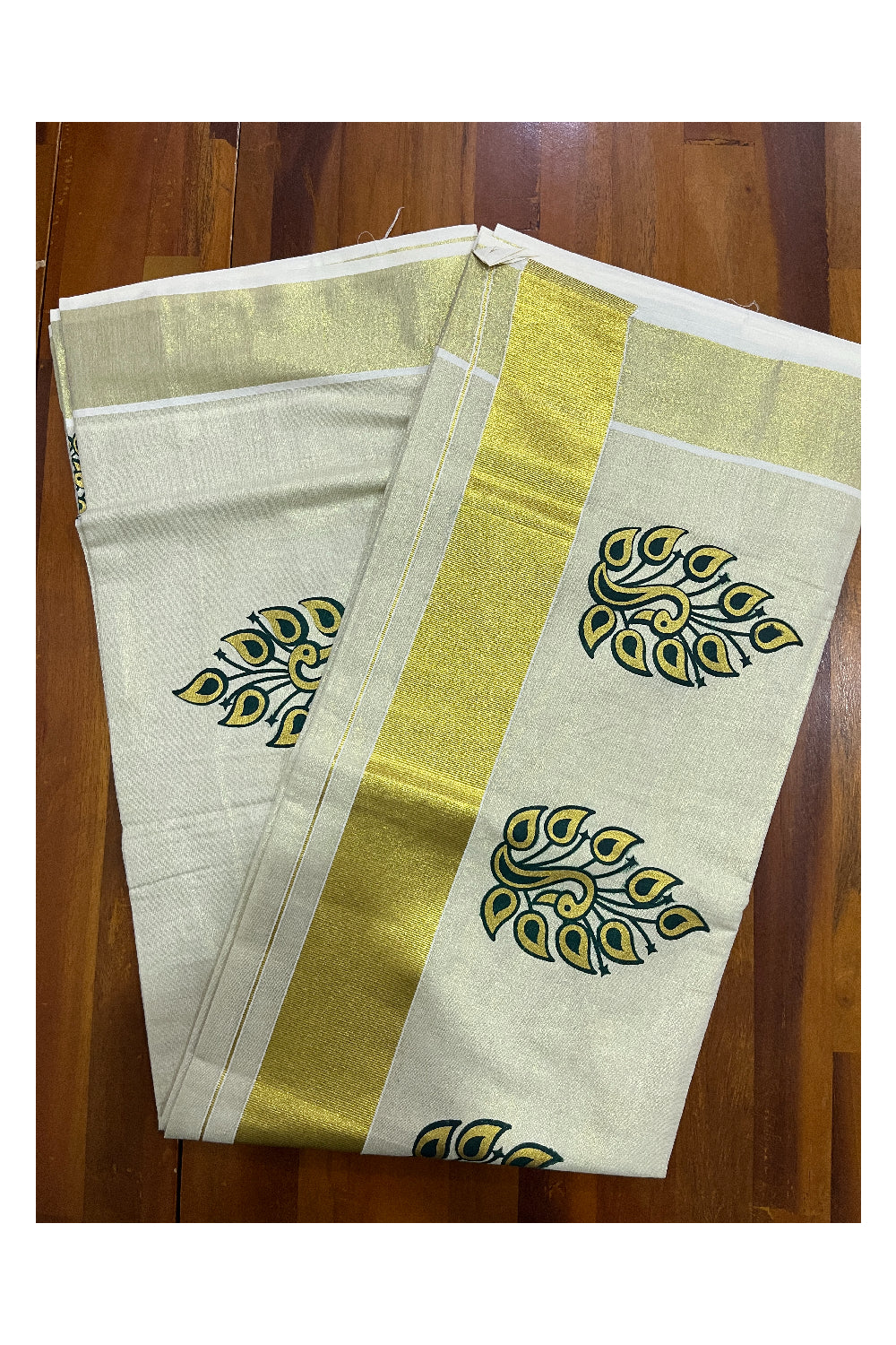 Kerala Tissue Kasavu Saree with Green and Golden Block Printed Design