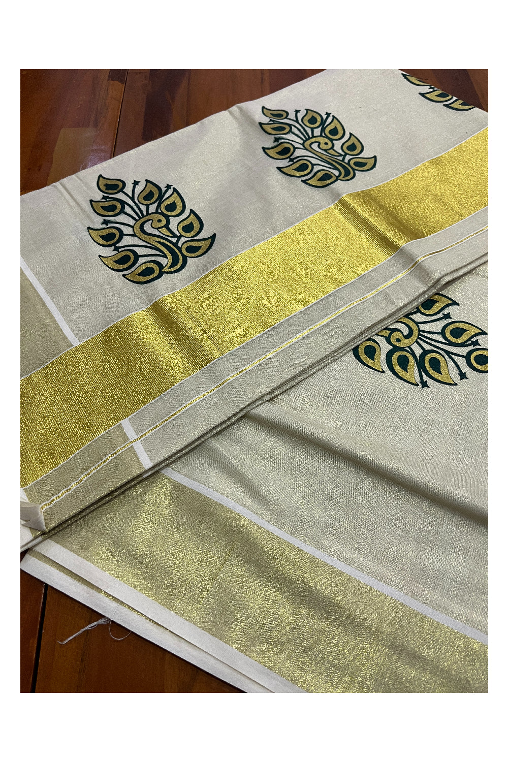 Kerala Tissue Kasavu Saree with Green and Golden Block Printed Design