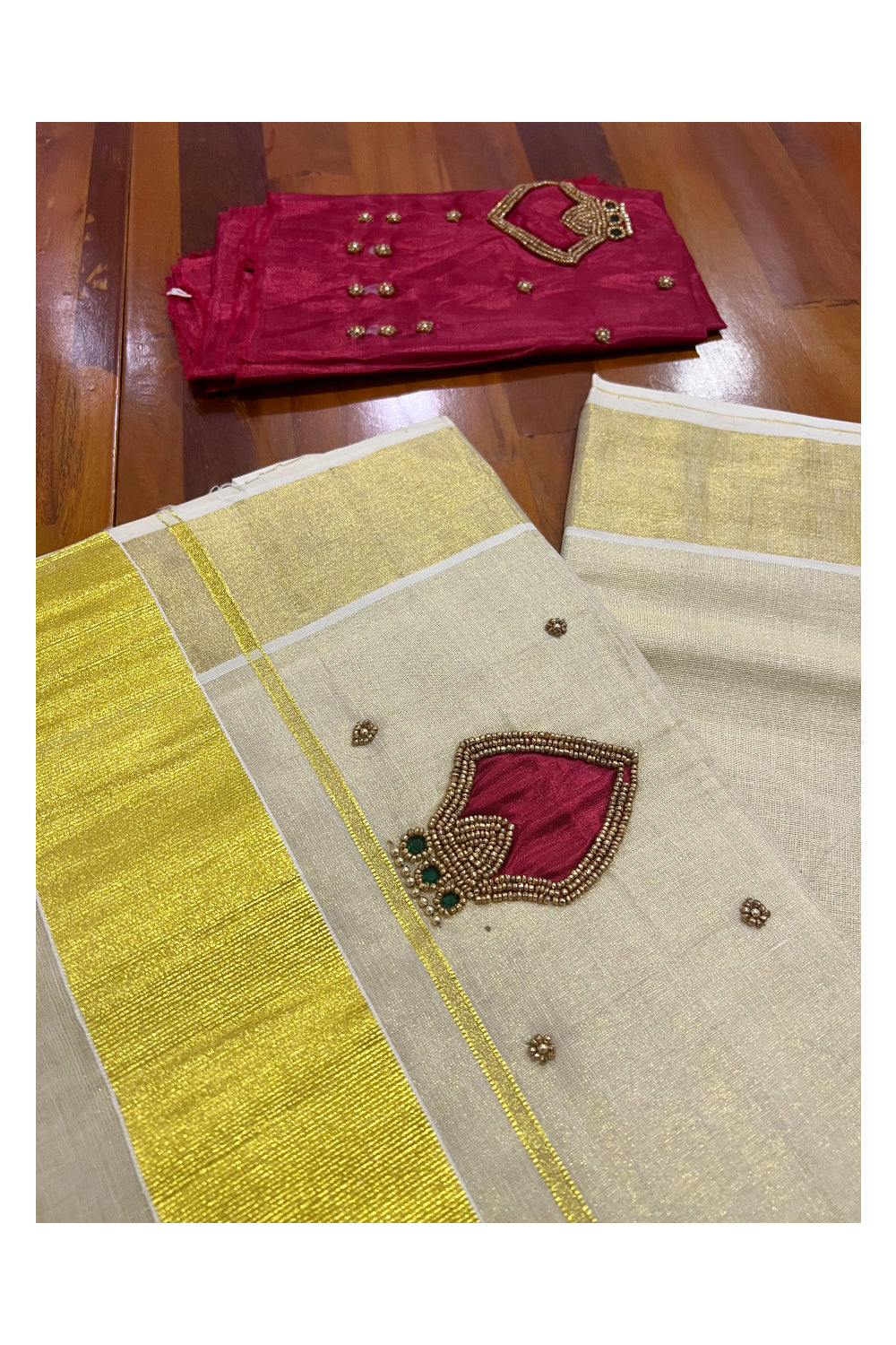 Kerala Tissue Kasavu Saree with Bead Work Design and Dark Red Blouse Piece