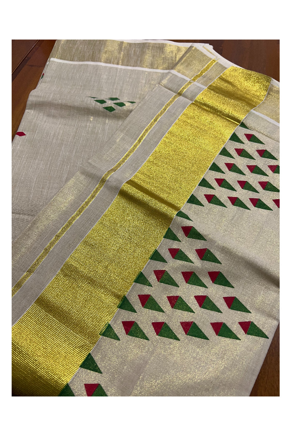 Kerala Tissue Kasavu Saree with Red and Green Block Print Design