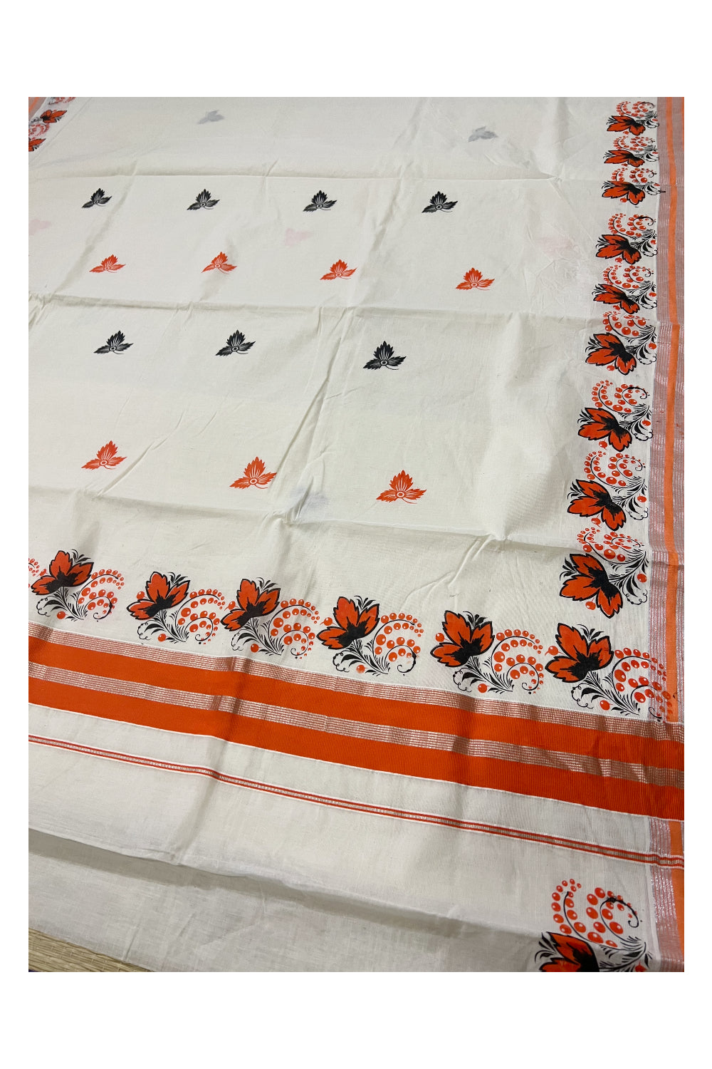 Pure Cotton Kerala Silver Kasavu Saree with Orange and Black Floral Block Printed Design