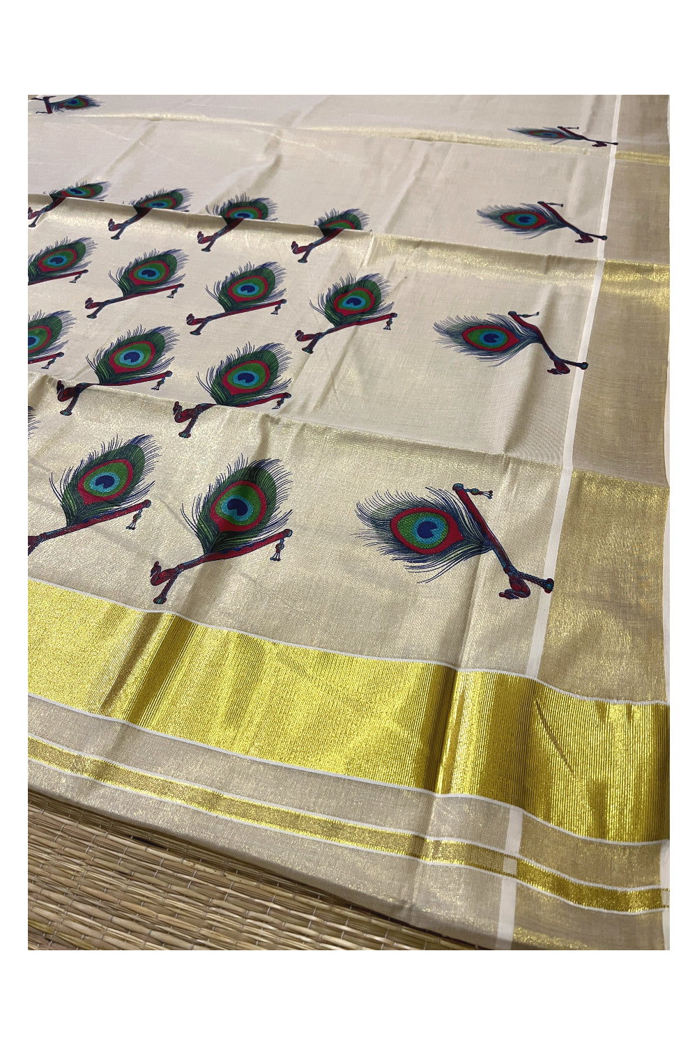 Kerala Tissue Kasavu Saree with Feather and Flute Mural Printed Design