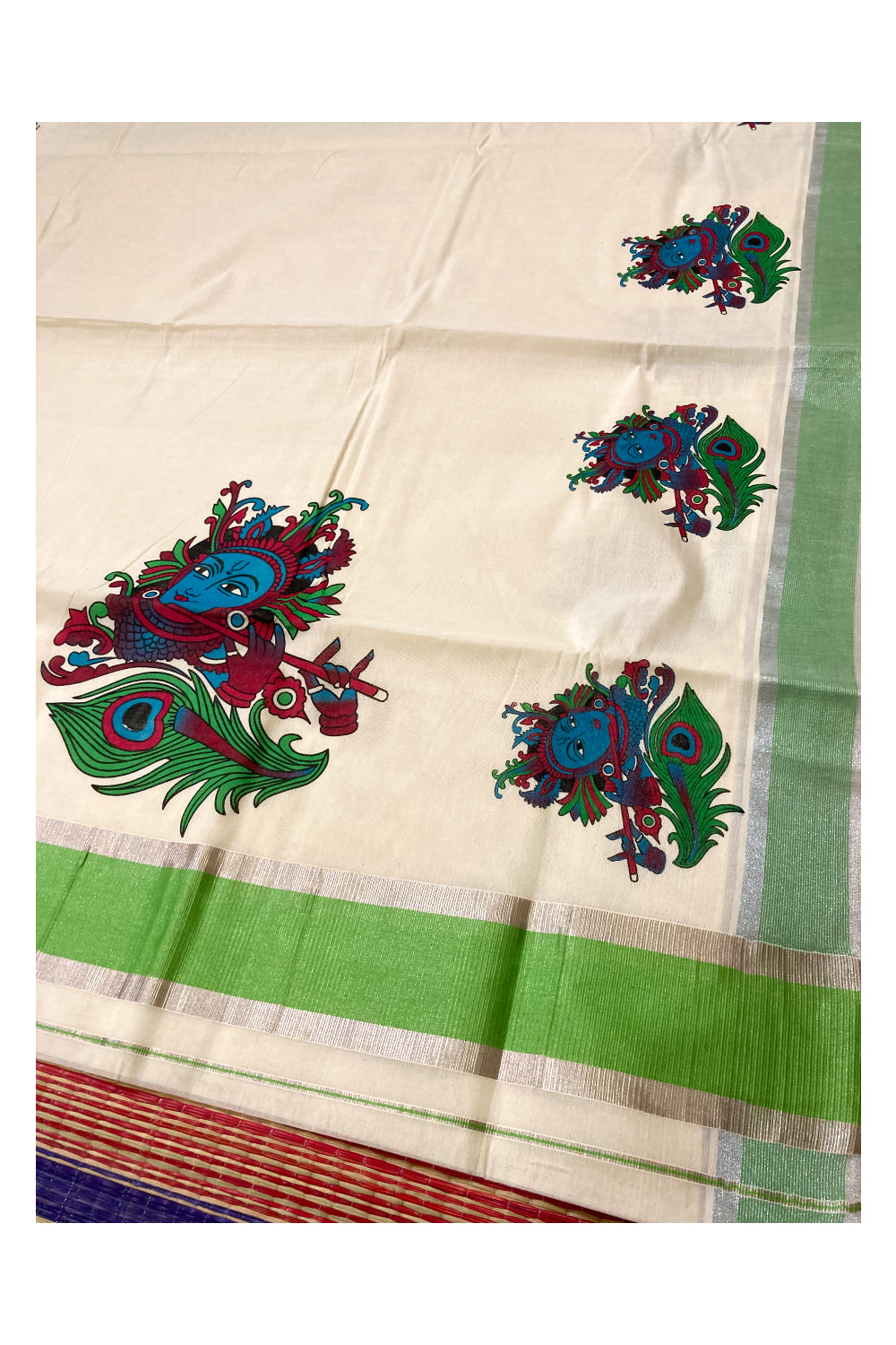 Pure Cotton Kerala Saree with Krishna Face Mural Prints and Silver Green Border