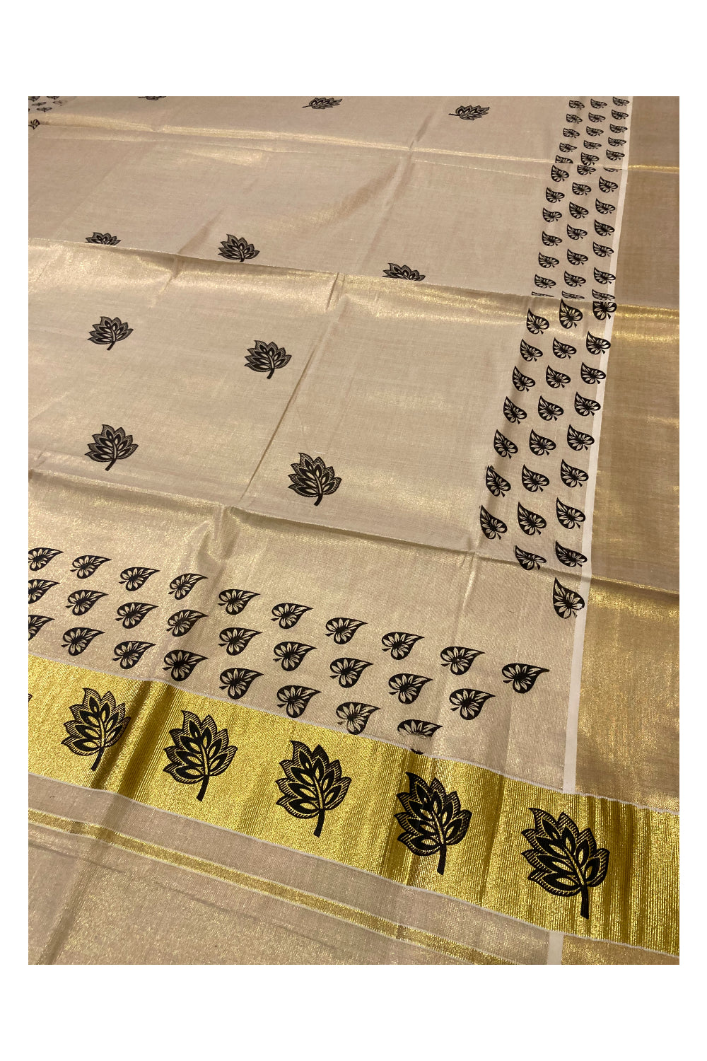 Kerala Tissue Kasavu Saree with Black Leaf Block Prints