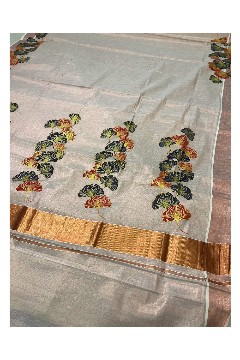 Kerala Copper Tissue Kasavu Saree With Mural Printed Dark Blue and Red Floral Design