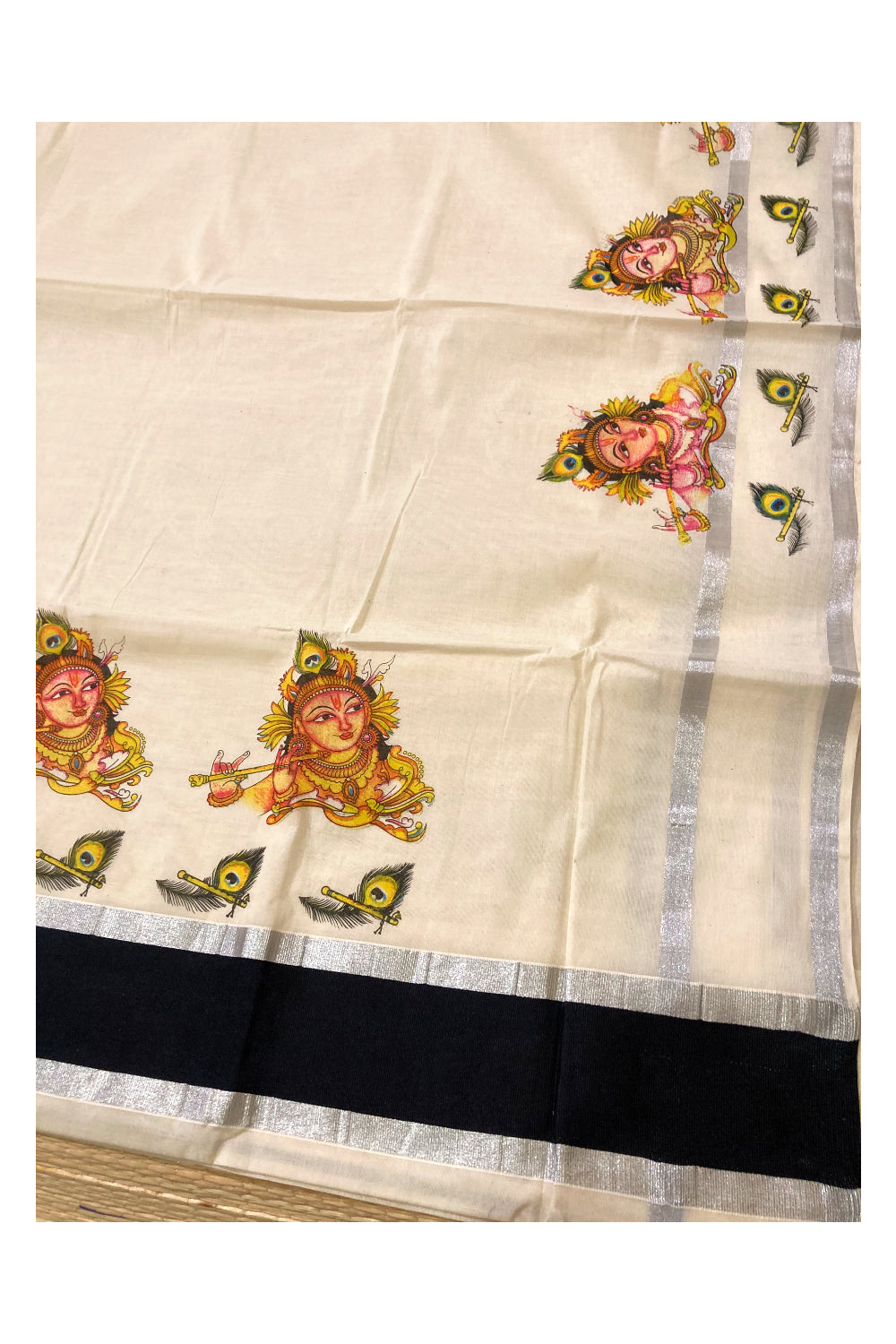 Pure Cotton Kerala Saree with Krishna Face Mural Prints and Silver Black Border