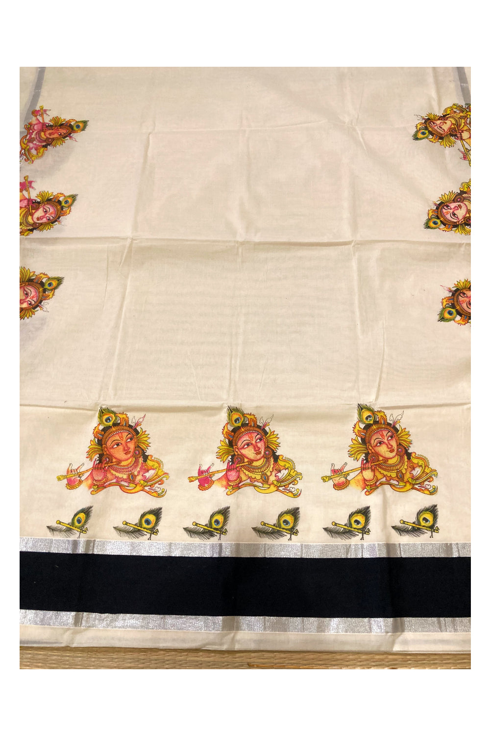 Pure Cotton Kerala Saree with Krishna Face Mural Prints and Silver Black Border