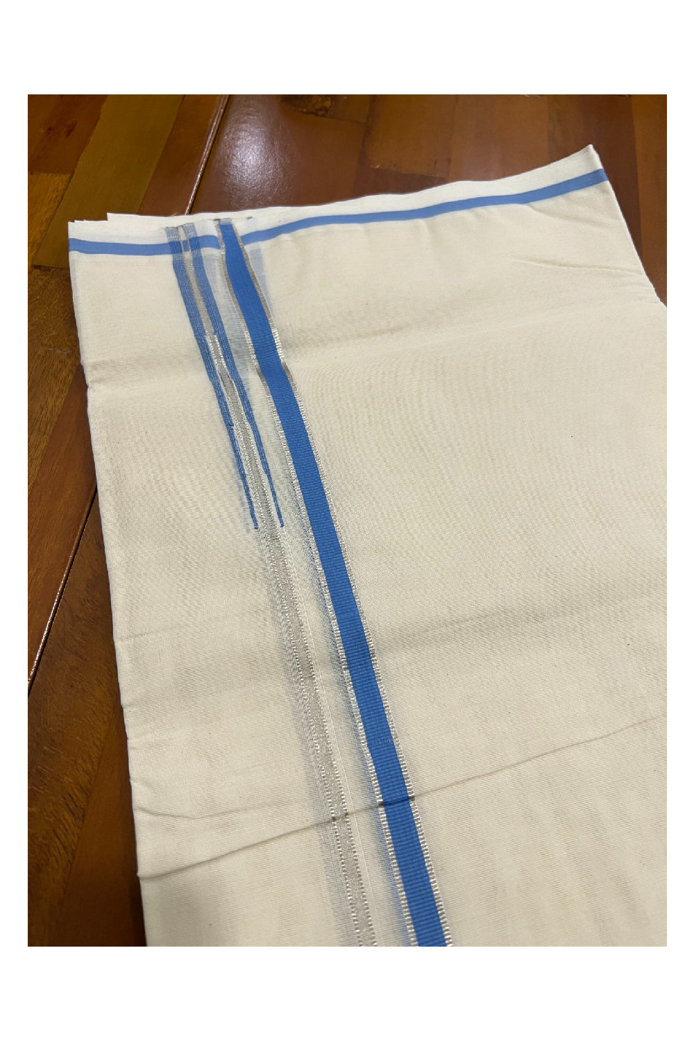 Off White Cotton Mundu with Light Blue and Silver Kasavu Puliyilakkara Border (South Indian Dhoti)