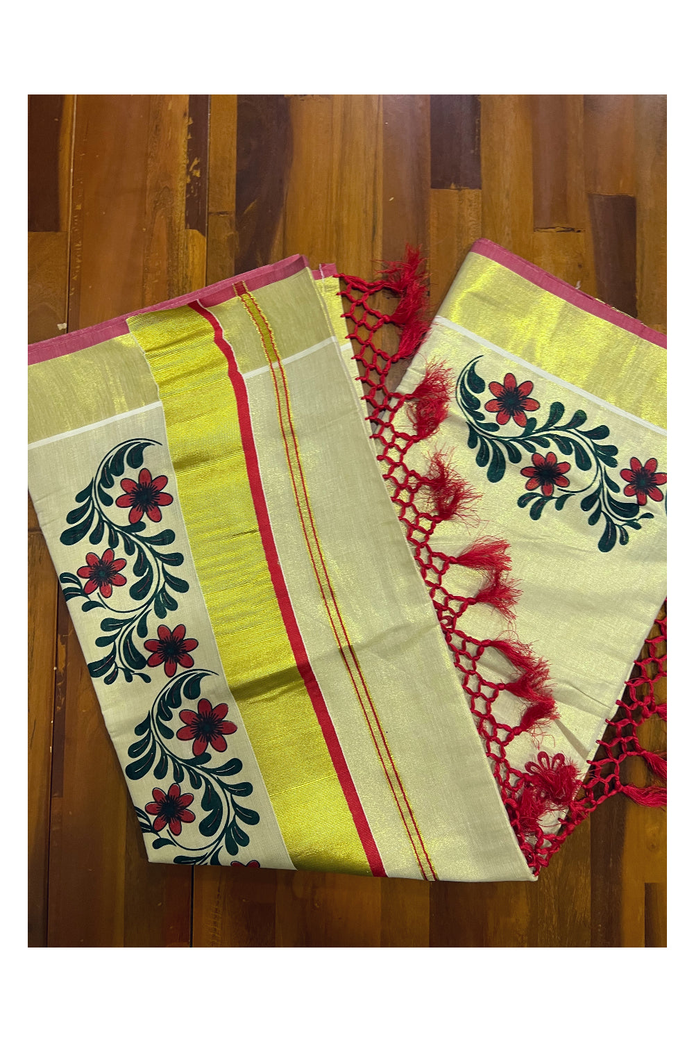 Kerala Tissue Kasavu Saree with Red Dark Green Mural Floral Design and Tassels on Pallu