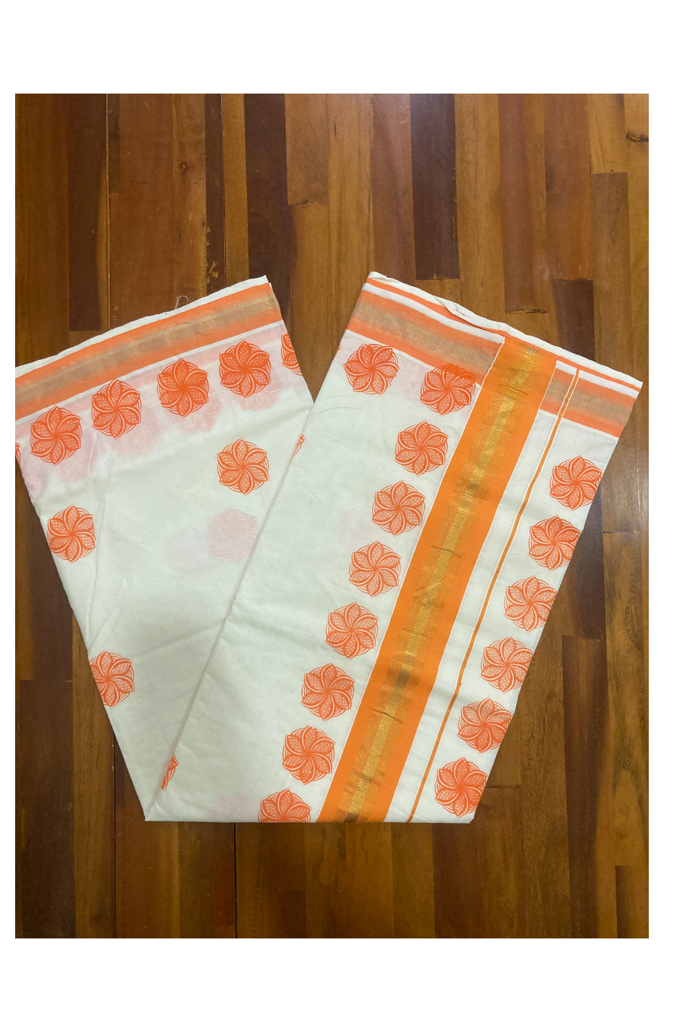 Pure Cotton Kerala Saree with Orange. Floral Block Printed Design and Kasavu Border