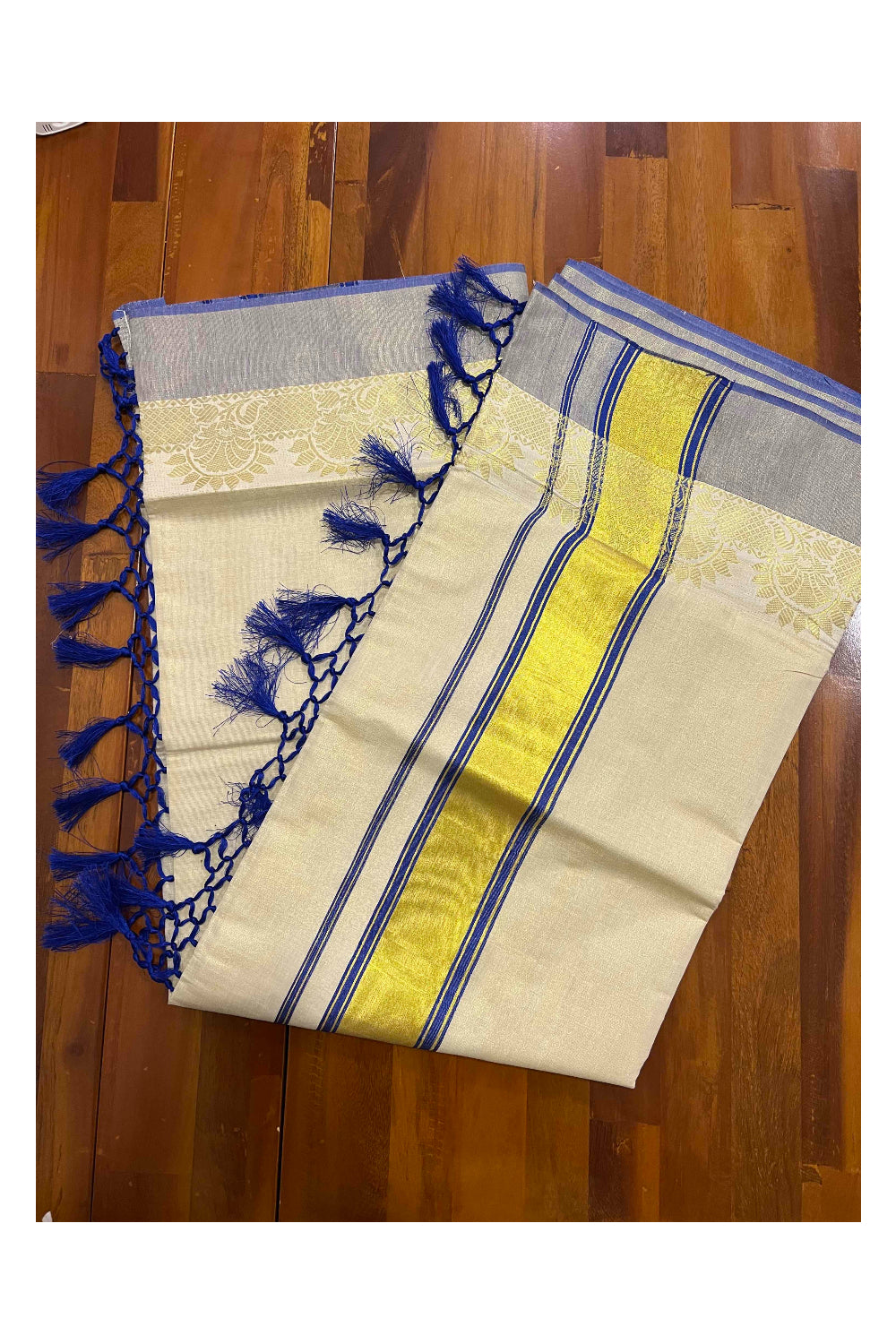 Kerala Tissue Plain Saree with Blue and Kasavu Border