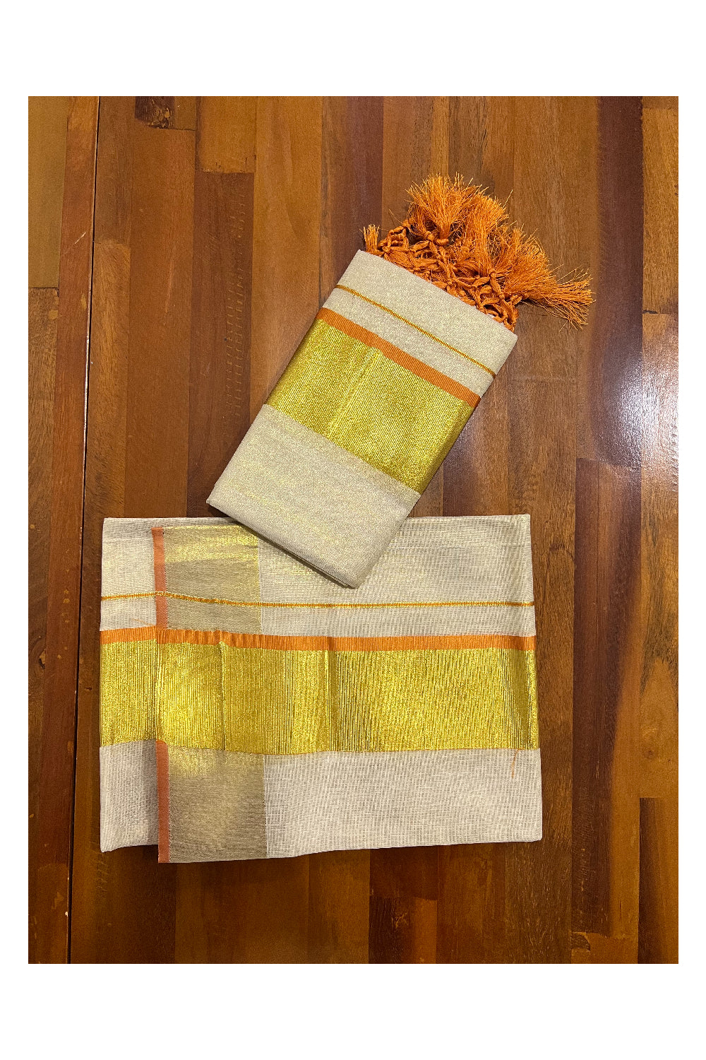 Kerala Tissue Kasavu Set Mundu (Mundum Neriyathum) with Kasavu and Orange Border and Tassels Work